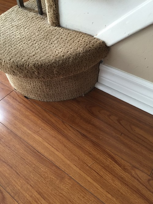 Finishing Bottom Of Stairs Does Such A Thing Exist And Would You Paint It To Match White Trim Or Try Stain Floor Thanks