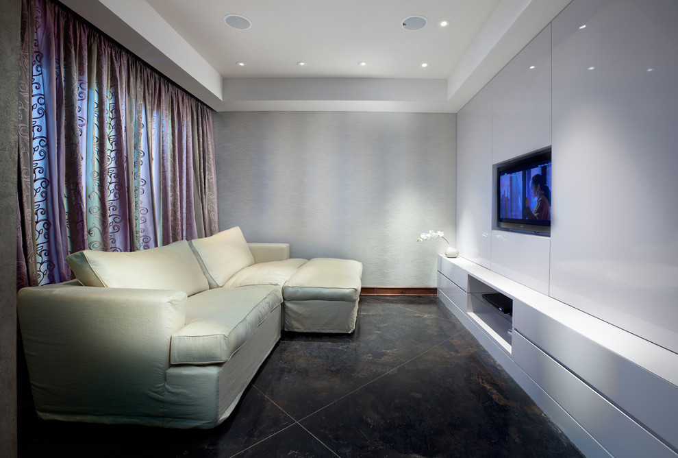 Contemporary enclosed home theatre in Other with white walls and a wall-mounted tv.