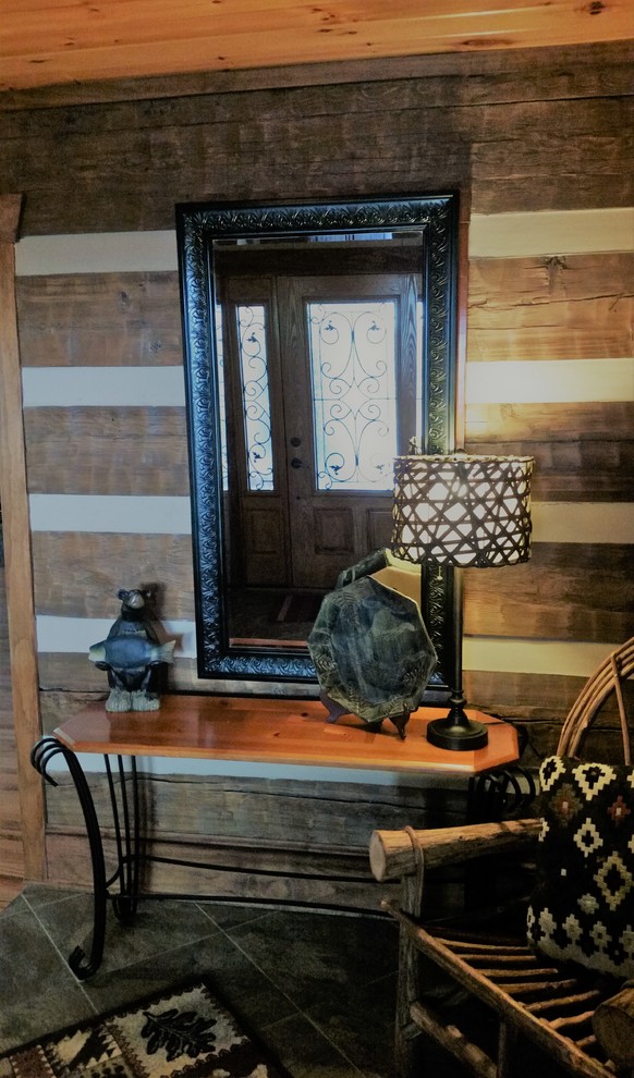 Foyer - mid-sized rustic slate floor foyer idea
