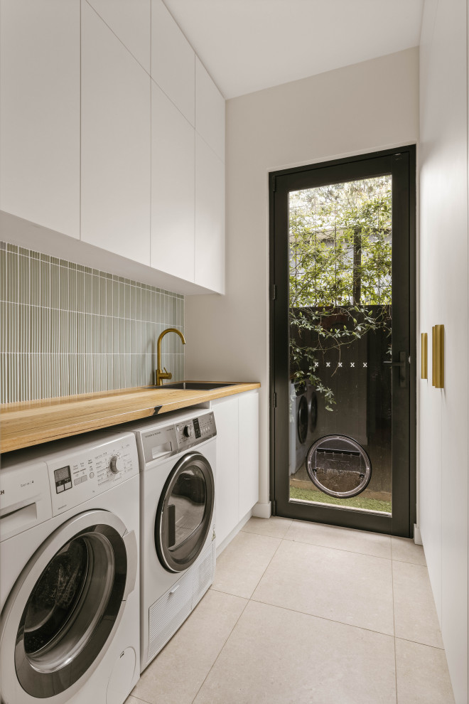 Inspiration for a modern laundry room in Melbourne.