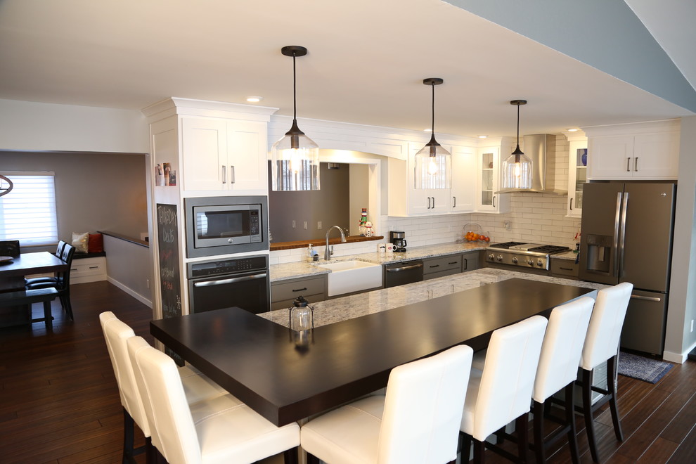Example of a transitional home design design in Cedar Rapids