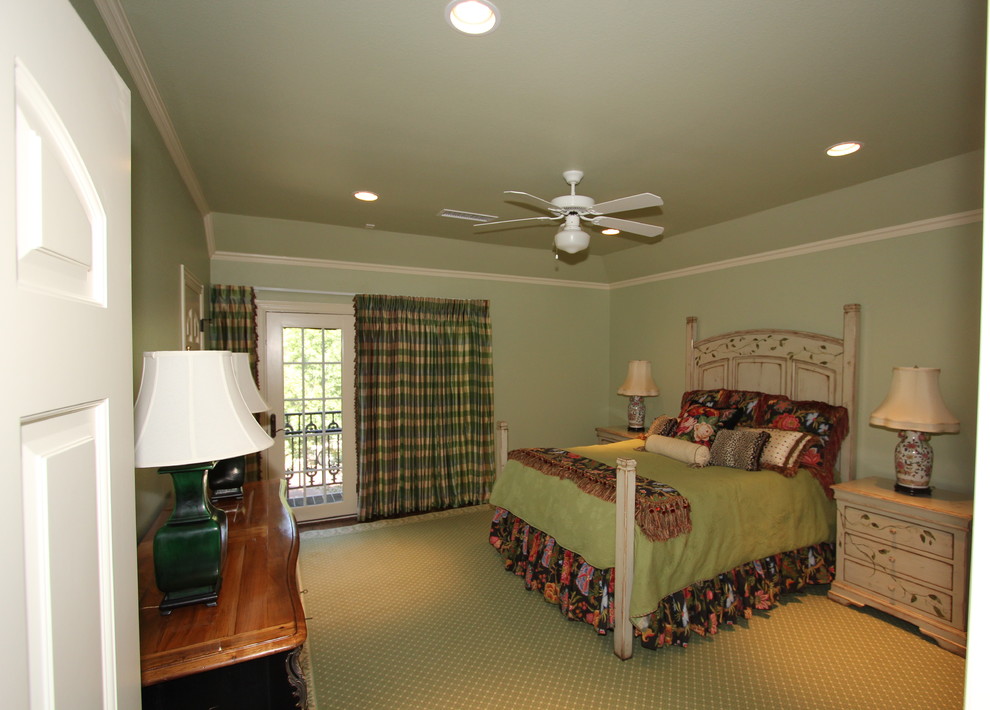 Design ideas for a mid-sized traditional guest bedroom in Other with green walls, carpet and green floor.