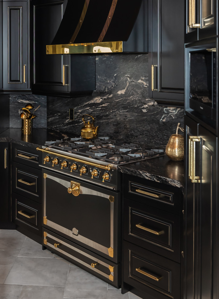 Large eclectic kitchen photo with raised-panel cabinets, black cabinets, granite countertops, black backsplash, granite backsplash, paneled appliances, an island and black countertops
