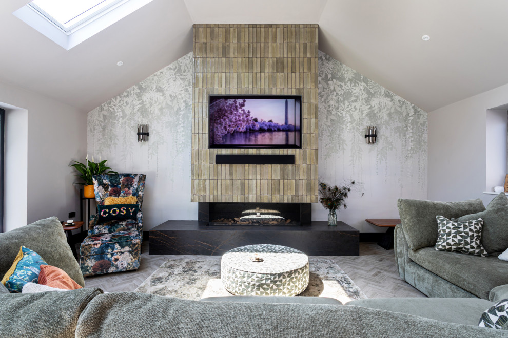 Inspiration for a contemporary open plan living room with grey walls, a ribbon fireplace, a brick fireplace surround, a wall mounted tv, grey floors, a vaulted ceiling and wallpapered walls.