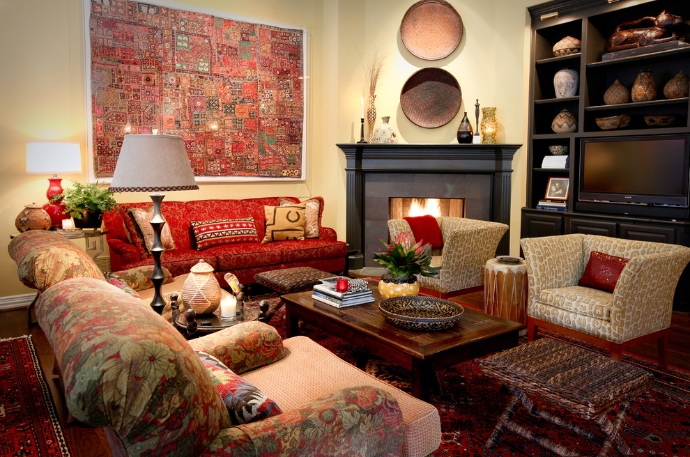 Design ideas for an eclectic enclosed family room in Dallas with yellow walls, a corner fireplace and a freestanding tv.