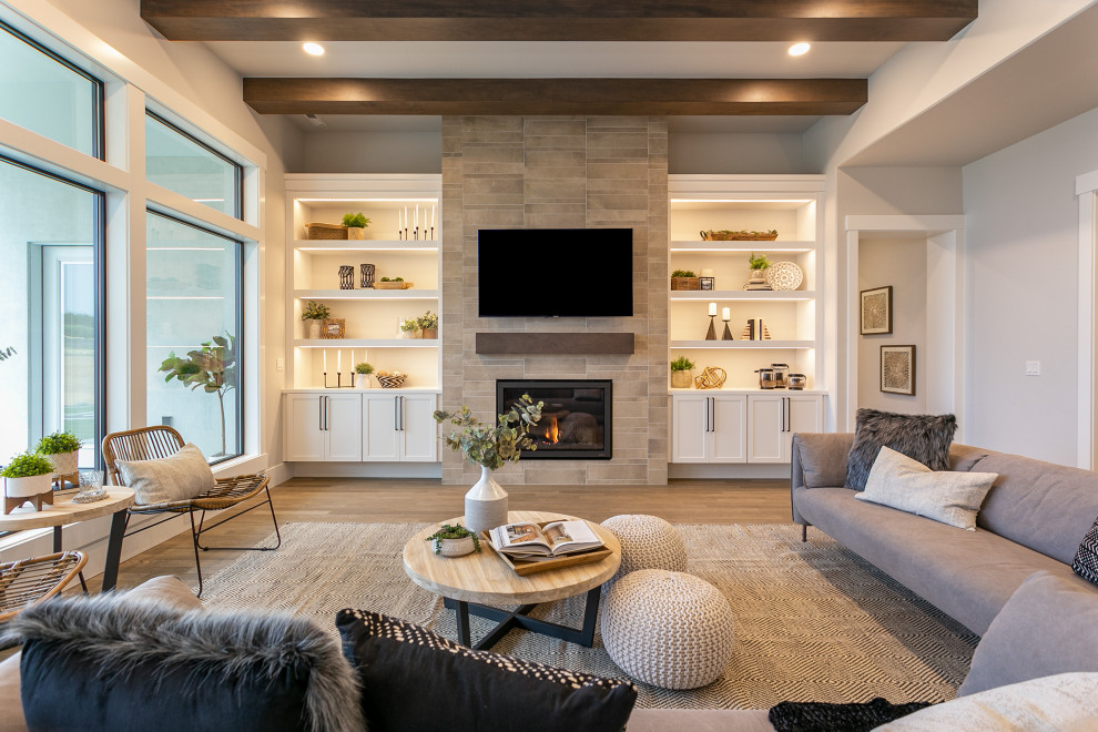 Transitional open concept living room photo in Seattle with a standard fireplace, a tile fireplace and no tv