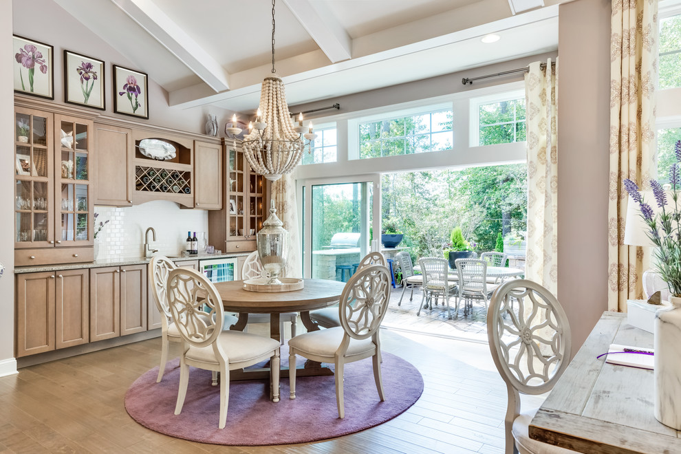Mid-sized traditional open plan dining in Other with purple walls, medium hardwood floors and brown floor.