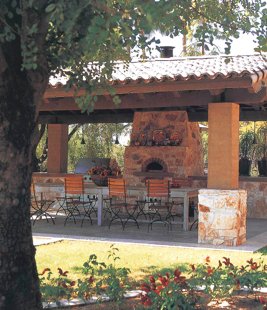 Design ideas for a traditional patio in Phoenix with an outdoor kitchen and a gazebo/cabana.
