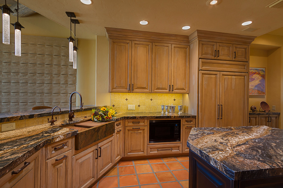 Inspiration for a large transitional open concept kitchen remodel in Phoenix with raised-panel cabinets, granite countertops and an island