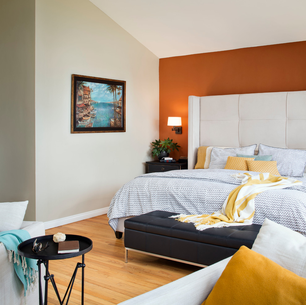 Design ideas for a mid-sized transitional master bedroom in San Francisco with multi-coloured walls, light hardwood floors, no fireplace and yellow floor.