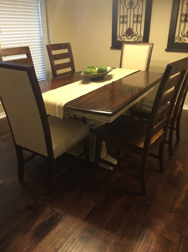 Inspiration for a mid-sized transitional dark wood floor and brown floor enclosed dining room remodel in Houston with beige walls and no fireplace