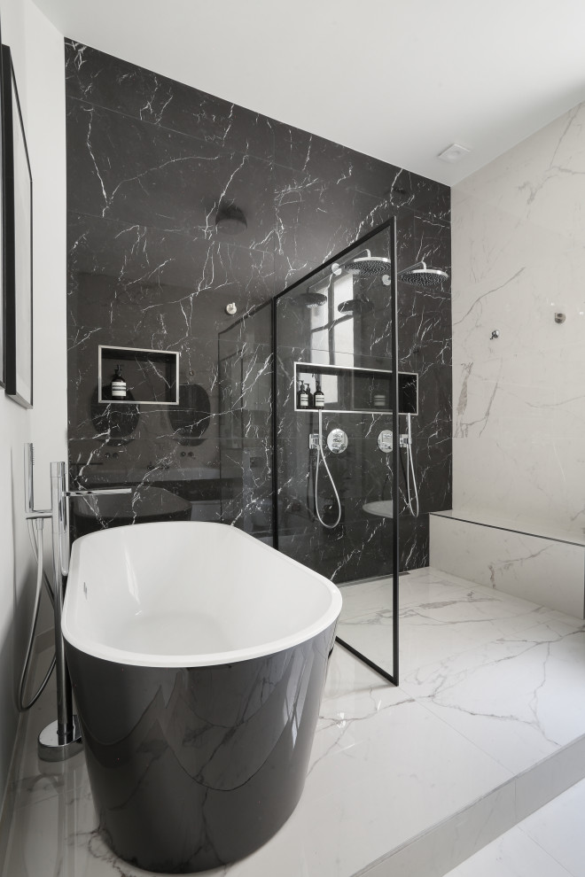 This is an example of an expansive classic ensuite wet room bathroom in Paris with beaded cabinets, white cabinets, a corner bath, white tiles, cement tiles, yellow walls, dark hardwood flooring, marble worktops, brown floors, white worktops, a chimney breast, double sinks, a built in vanity unit, a wallpapered ceiling and wallpapered walls.