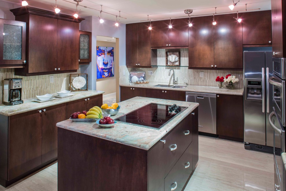 Small modern u-shaped separate kitchen in Miami with a drop-in sink, flat-panel cabinets, dark wood cabinets, granite benchtops, beige splashback, stone tile splashback, stainless steel appliances, marble floors and with island.