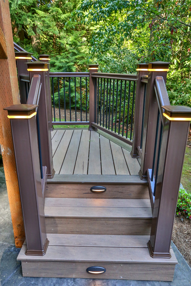 Inspiration for a huge modern backyard deck remodel in Seattle with no cover