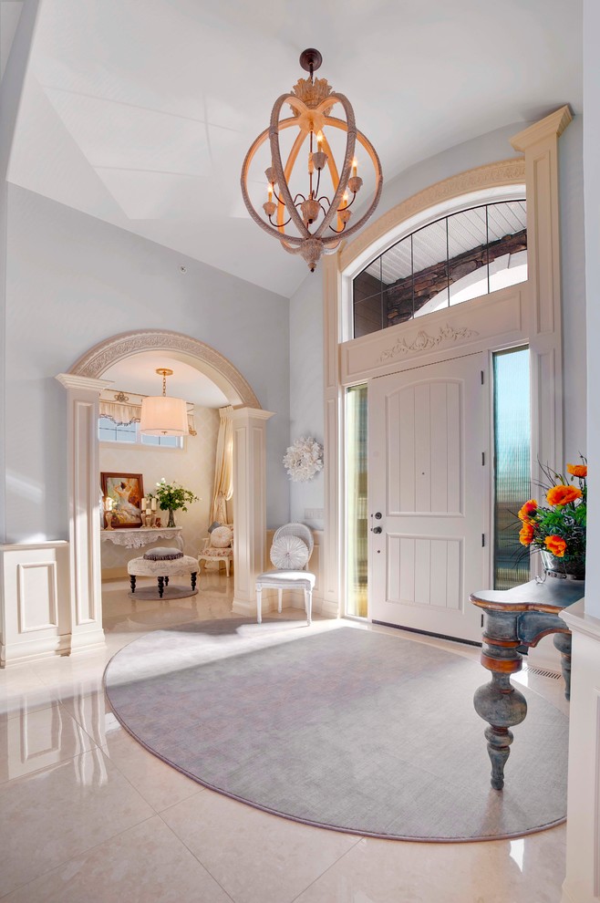 Inspiration for a transitional entryway remodel in Calgary