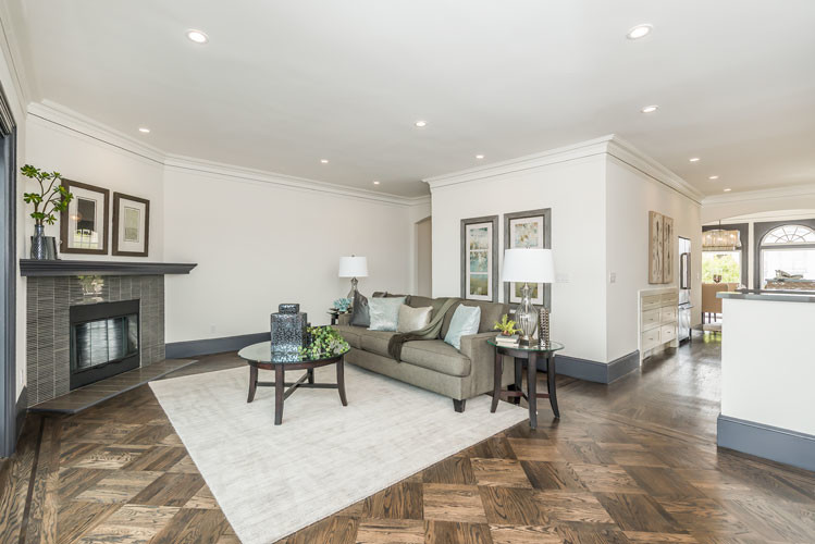 Mid-sized transitional formal open concept living room in San Francisco with white walls, dark hardwood floors, a standard fireplace, a tile fireplace surround and no tv.