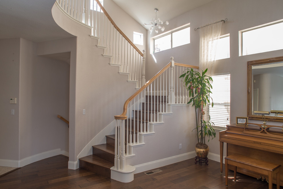 Inspiration for a large arts and crafts wood l-shaped staircase in Los Angeles with wood risers.