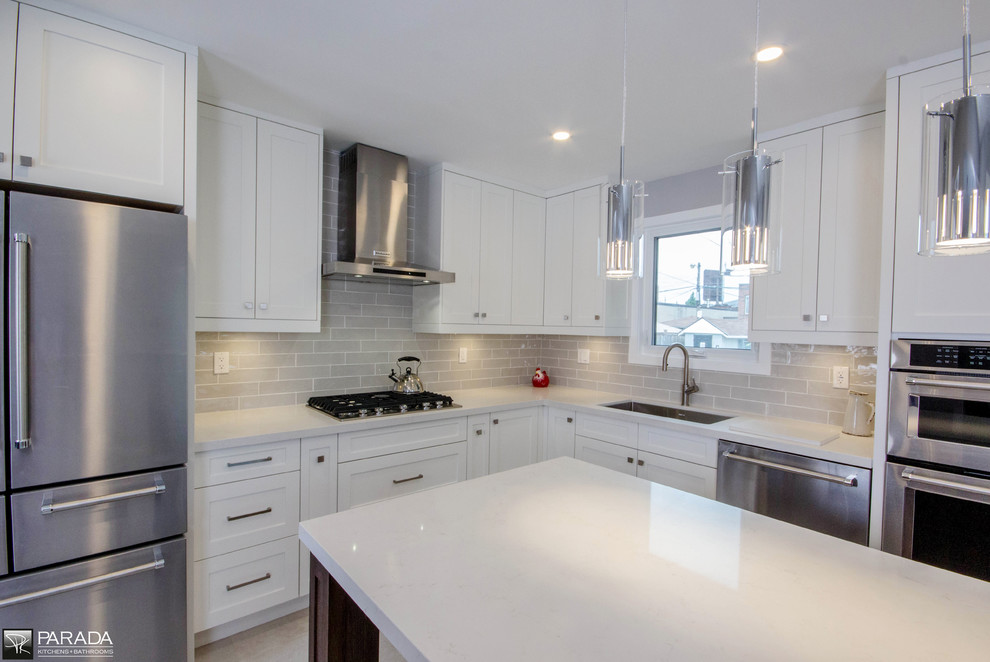 Example of a transitional kitchen design in Toronto