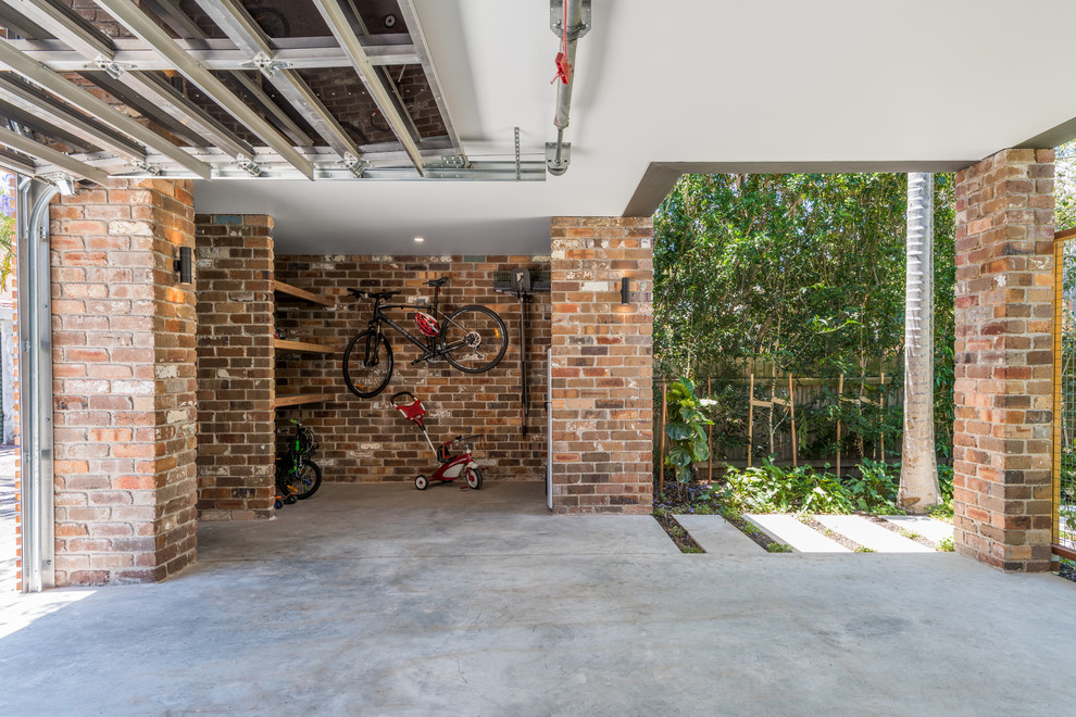 Design ideas for a mid-sized modern detached two-car garage in Sydney.