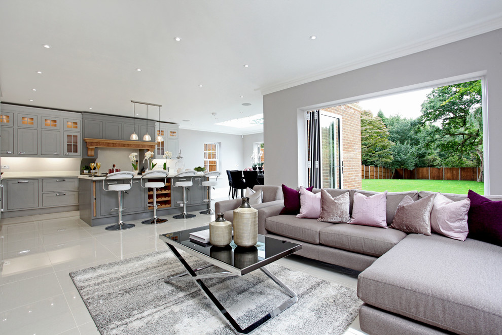 Photo of a contemporary formal open concept living room in Surrey with grey walls.