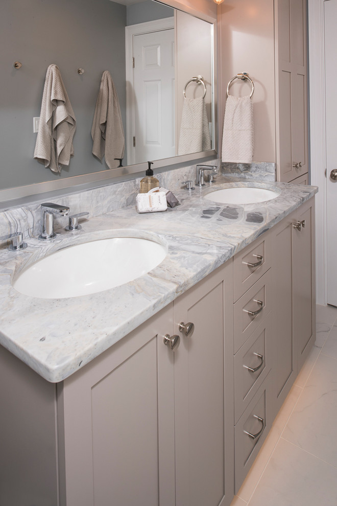 Example of a small transitional master gray tile and ceramic tile ceramic tile and gray floor alcove bathtub design in Boston with flat-panel cabinets, gray cabinets, gray walls, an undermount sink, granite countertops and a hinged shower door
