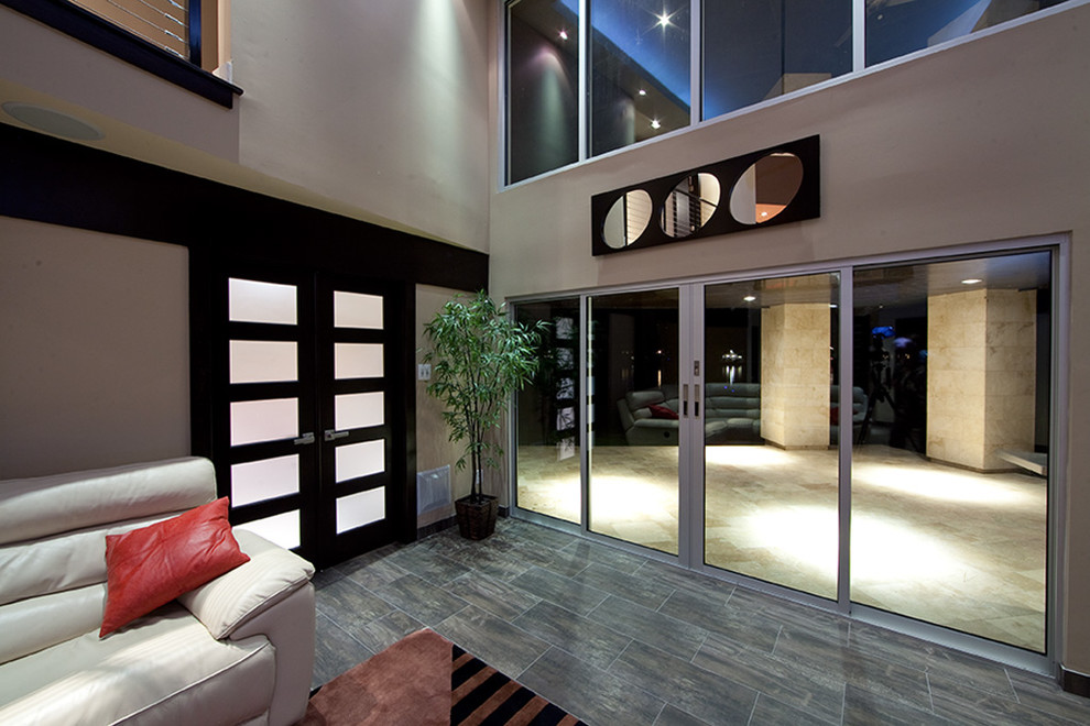 Large contemporary open concept living room in Houston with white walls, no fireplace, no tv and porcelain floors.