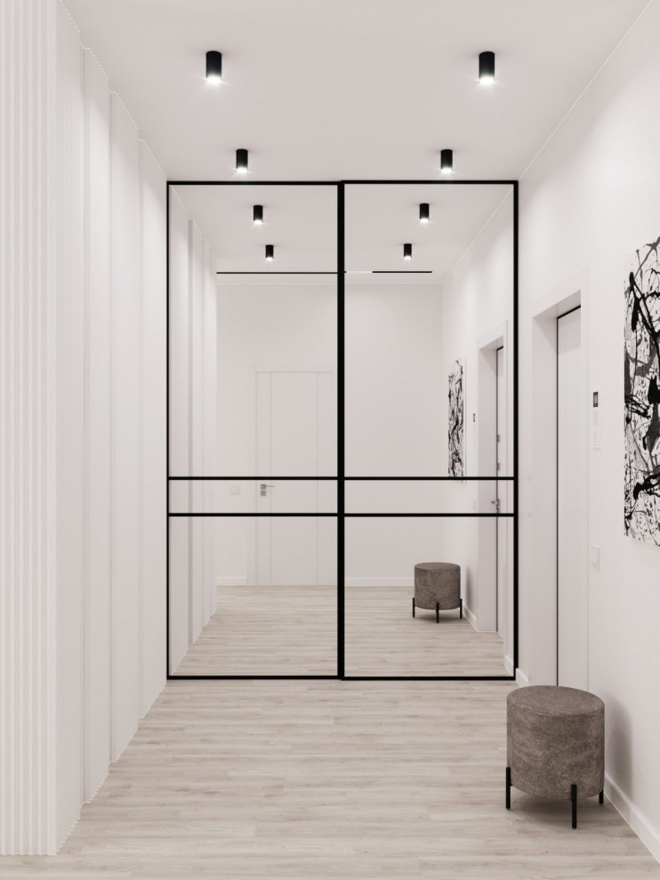 Стильный дизайн: входная дверь среднего размера: освещение в современном стиле с белыми стенами, светлым паркетным полом, одностворчатой входной дверью, белой входной дверью, бежевым полом, любым потолком и любой отделкой стен - последний тренд