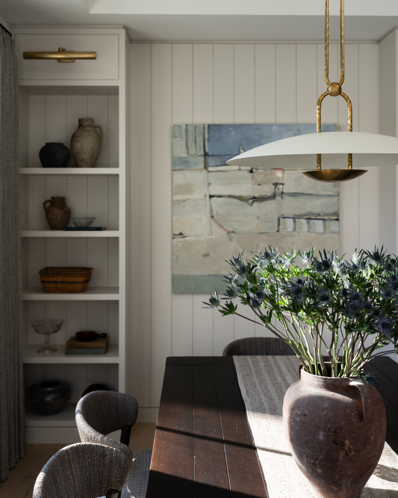 Dining room - transitional light wood floor dining room idea in Orange County