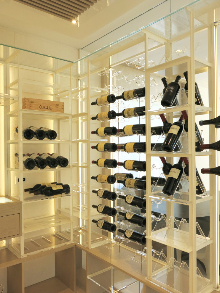 Design ideas for a transitional wine cellar in Miami.