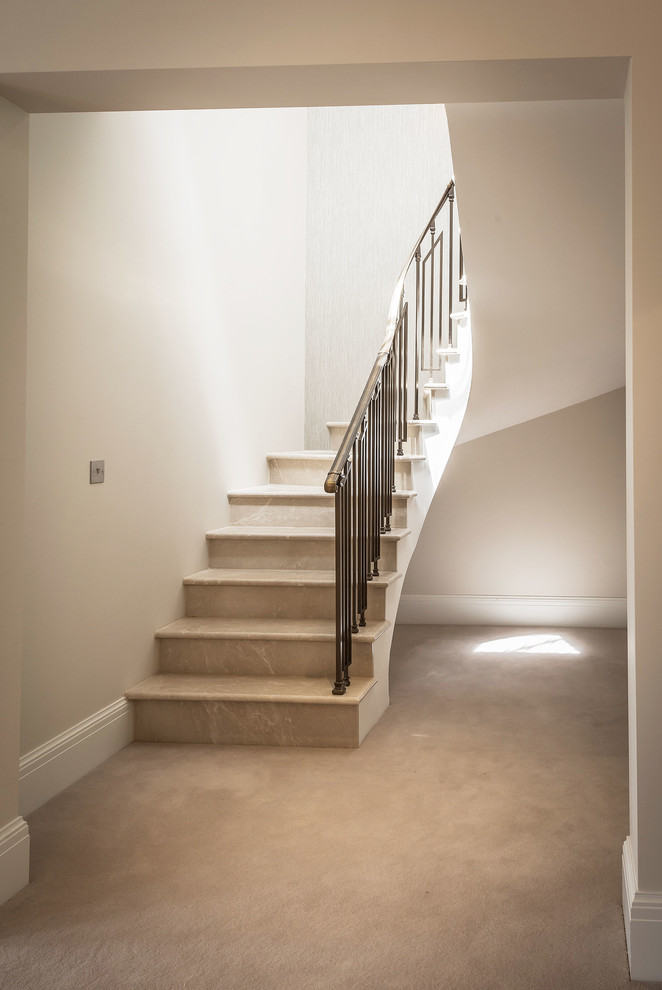 Example of a cottage staircase design in Surrey