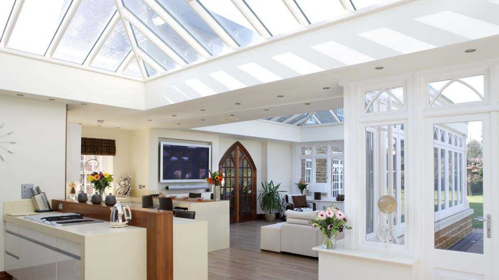 Inspiration for a large timeless sunroom remodel in Other