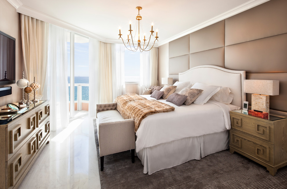 Mid-sized transitional master bedroom in Miami with beige walls, marble floors, no fireplace and white floor.