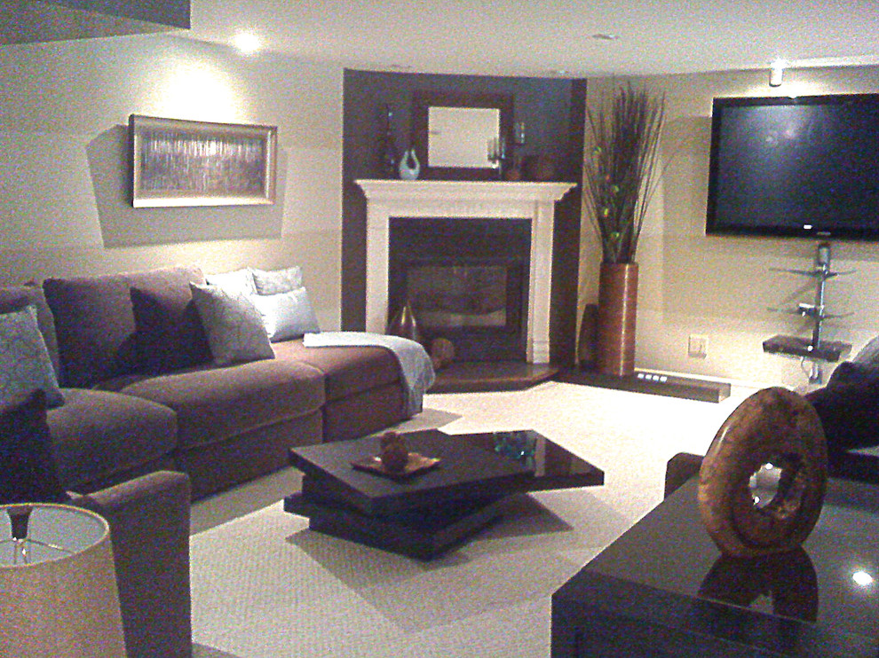 This is an example of a contemporary family room in Montreal.