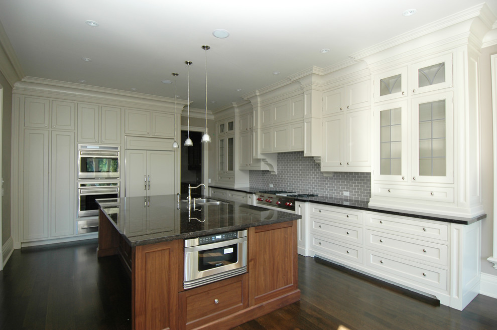 Example of a transitional kitchen design in Toronto