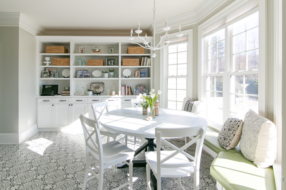 Large transitional porcelain tile and white floor open concept kitchen photo with a farmhouse sink, beaded inset cabinets, white cabinets, quartzite countertops, white backsplash, porcelain backsplash, stainless steel appliances and white countertops