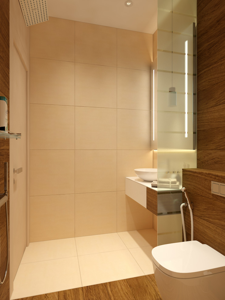 Inspiration for a small contemporary 3/4 bathroom in Other with flat-panel cabinets, beige cabinets, a curbless shower, a wall-mount toilet, beige tile, porcelain tile, brown walls, porcelain floors, a vessel sink, solid surface benchtops, brown floor, an open shower, beige benchtops, a single vanity and a floating vanity.