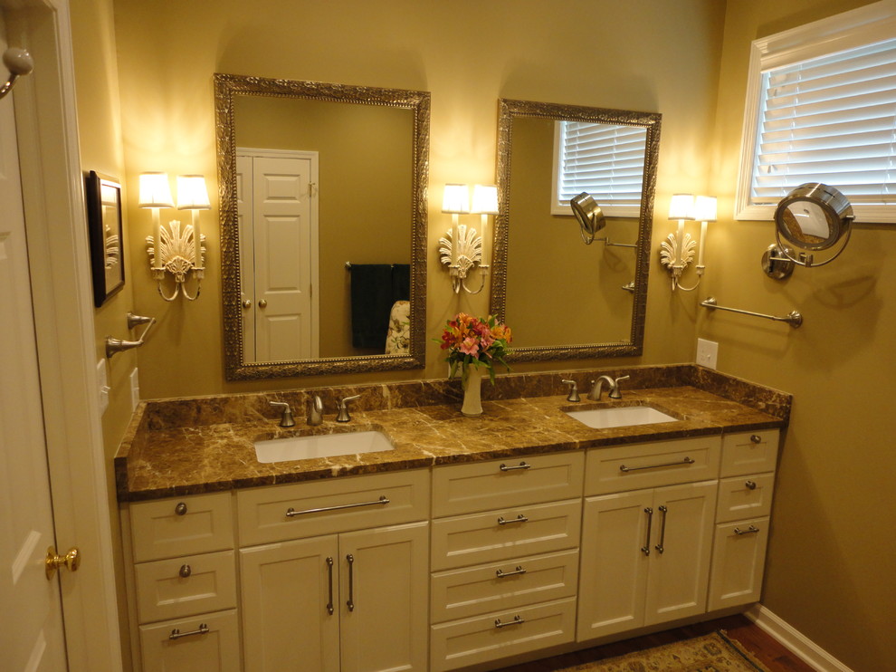 Mid-sized traditional master bathroom in Other with recessed-panel cabinets, white cabinets, a corner shower, a one-piece toilet, beige tile, ceramic tile, beige walls, dark hardwood floors, an undermount sink and granite benchtops.