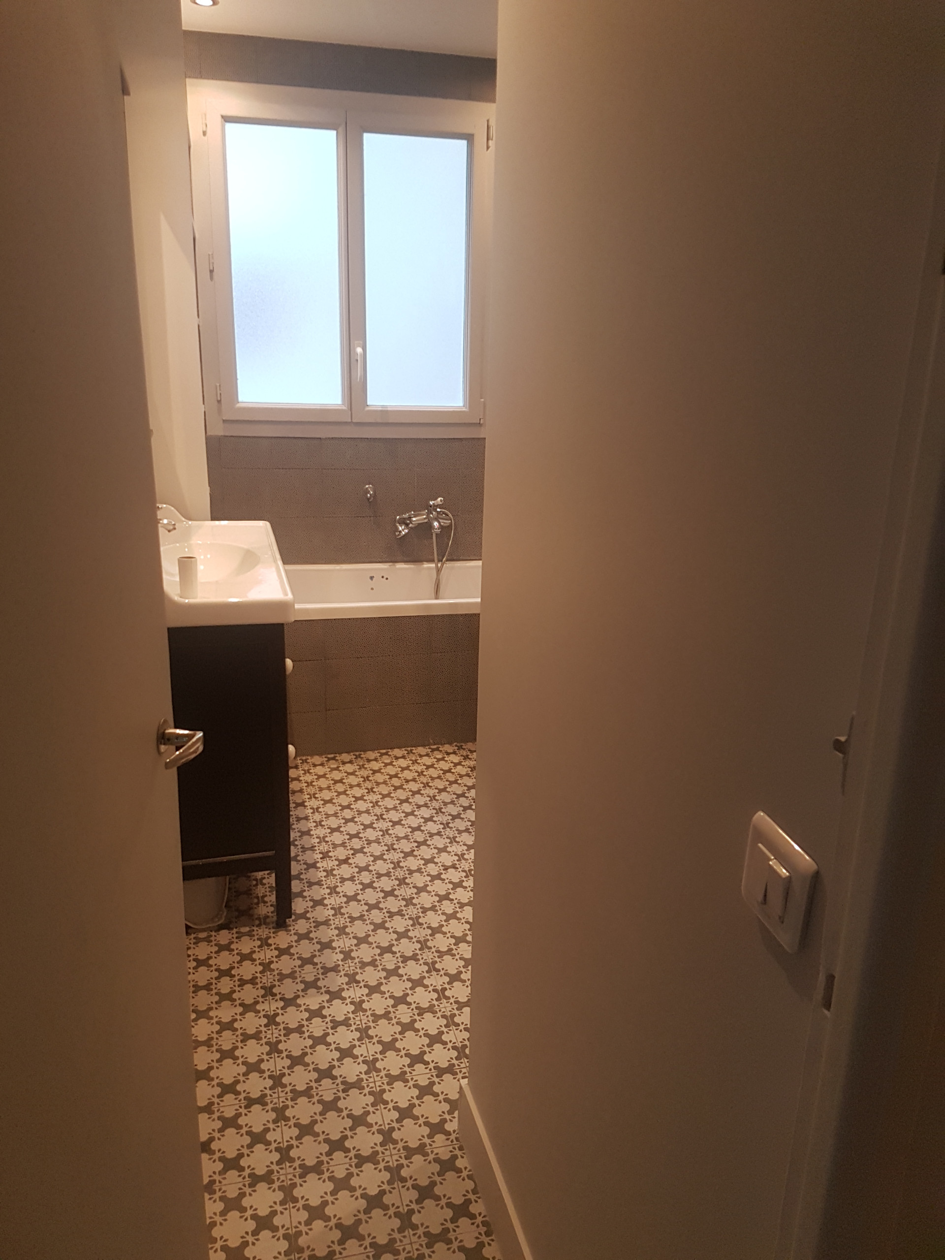 Appartement refondu suite à l'ajout d'un espace voisin