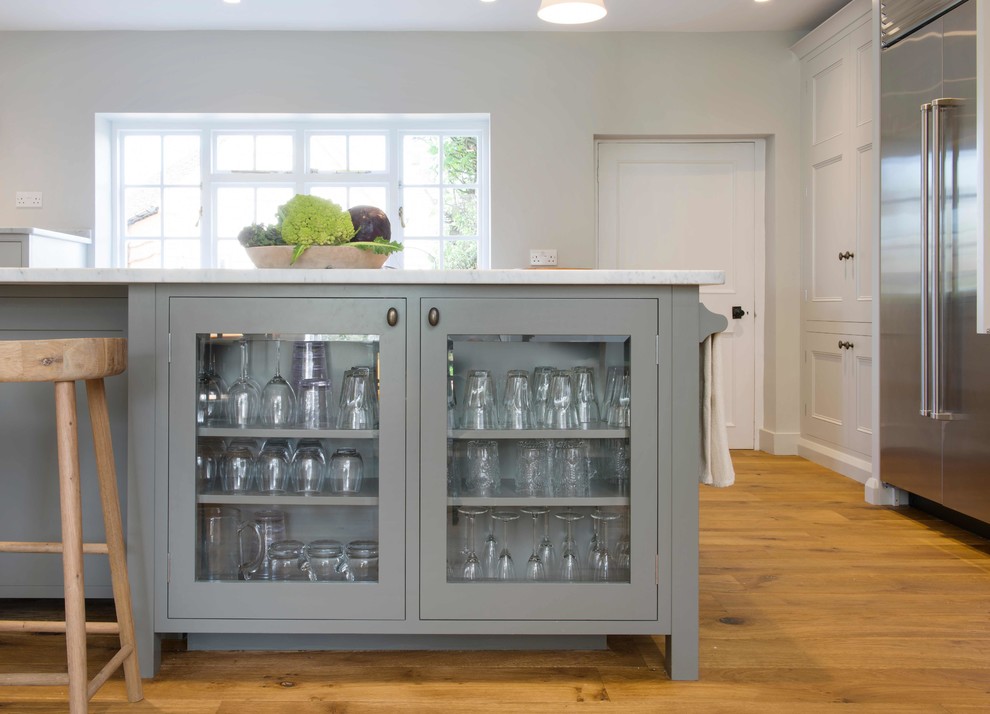 This is an example of a transitional kitchen in Sussex.