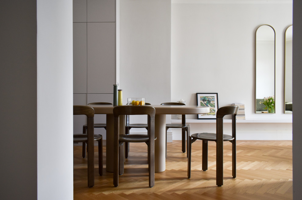 Idee per una sala da pranzo aperta verso il soggiorno moderna di medie dimensioni con pareti grigie