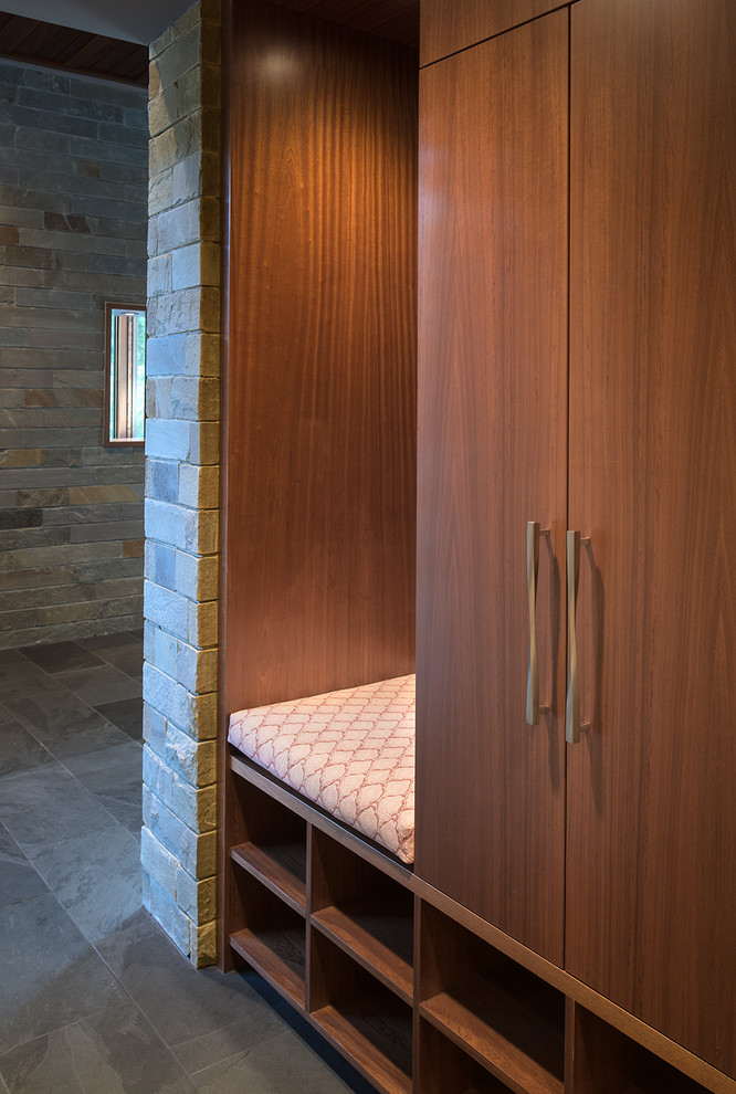 This is an example of a modern mudroom in DC Metro with slate floors.