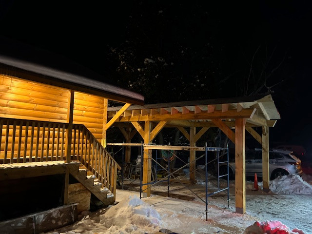Log Siding, Stamped Concrete and Post and Beam Carport