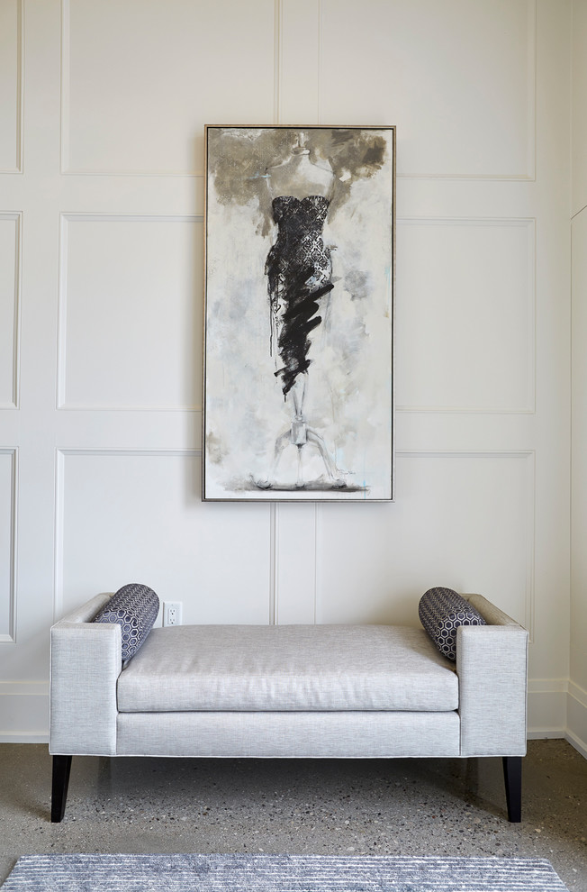 Large transitional concrete floor foyer photo in Toronto with white walls