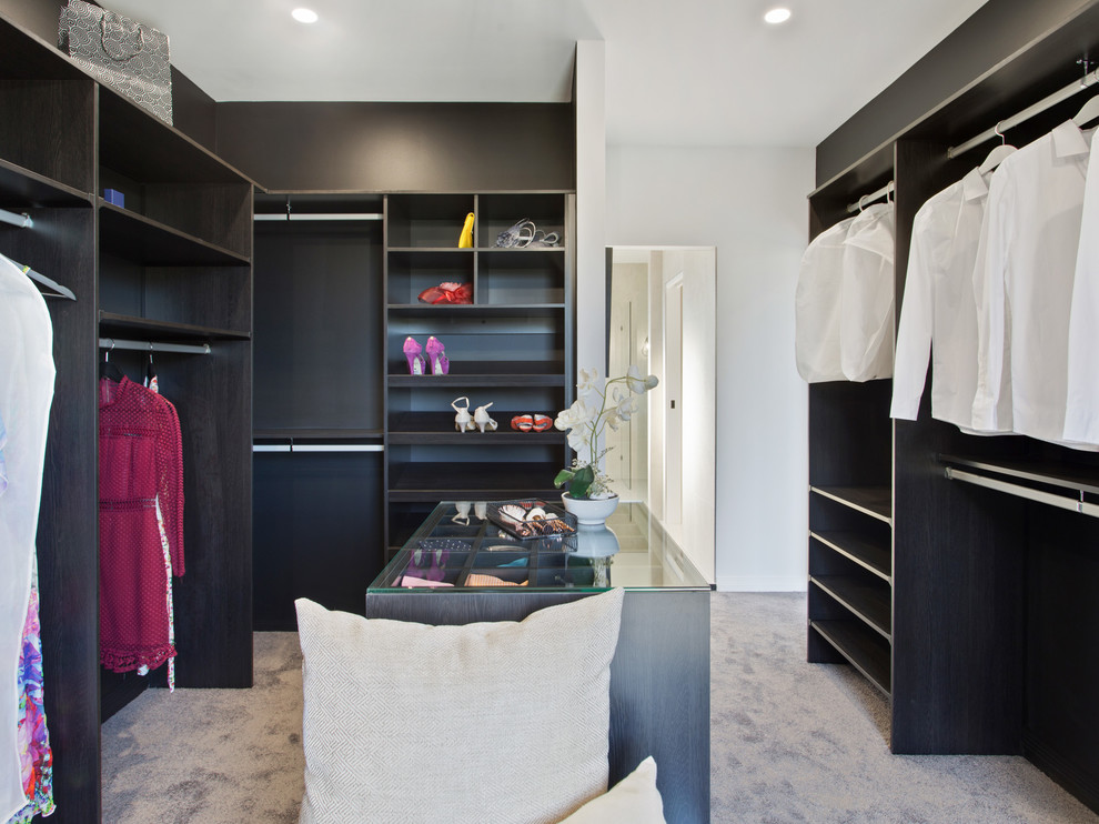 This is an example of a contemporary storage and wardrobe in Brisbane.