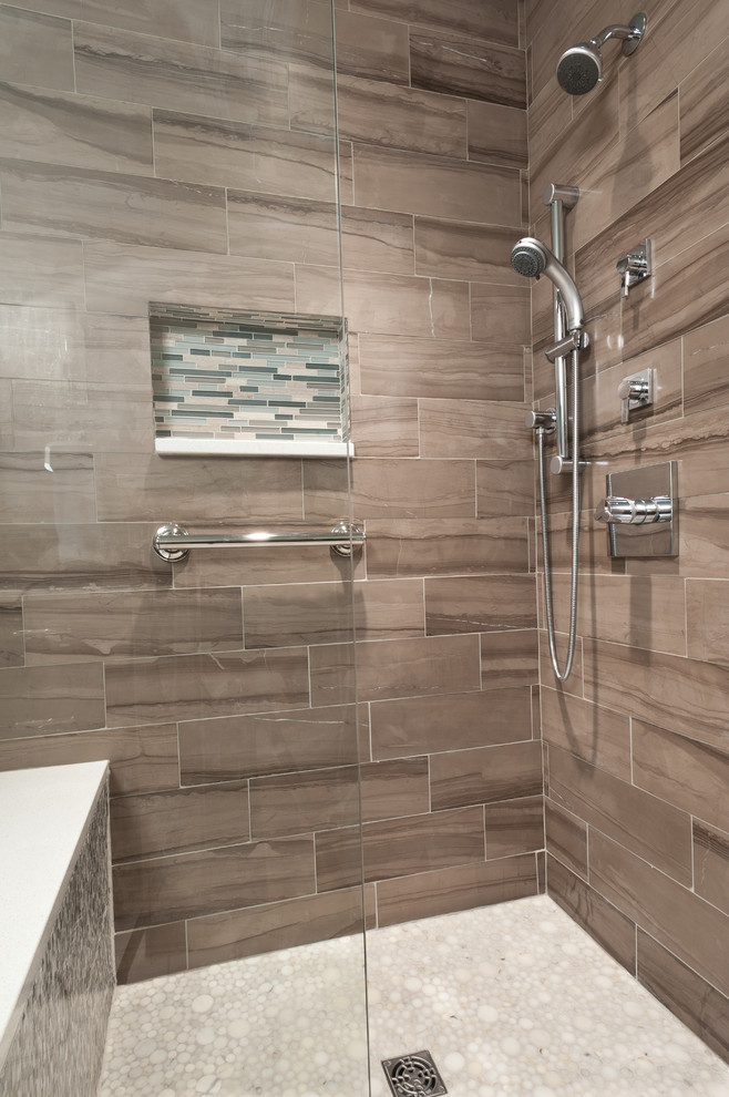 Design ideas for a large transitional master bathroom in St Louis with an undermount sink, flat-panel cabinets, beige cabinets, an undermount tub, a curbless shower, beige tile, porcelain tile, brown walls and porcelain floors.