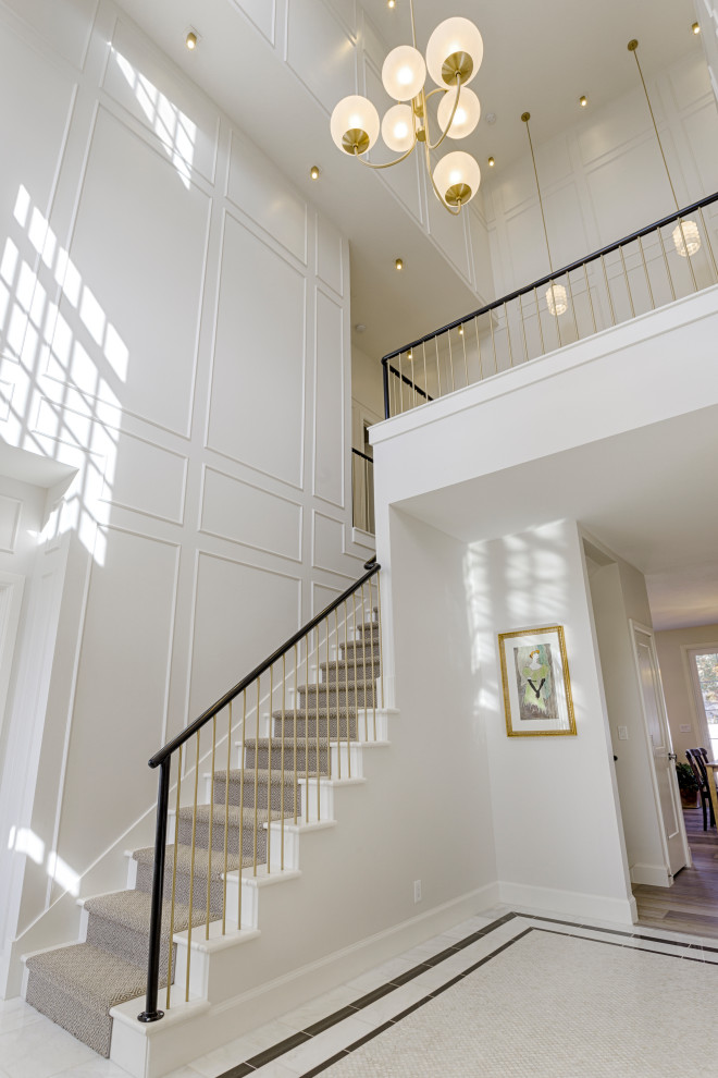Photo of an expansive traditional foyer in Salt Lake City with white walls, ceramic floors, a single front door, a white front door and white floor.