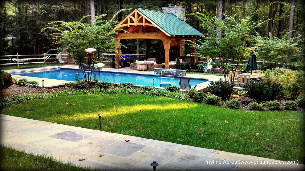 Inspiration for a huge transitional backyard concrete paver and rectangular lap pool fountain remodel in DC Metro