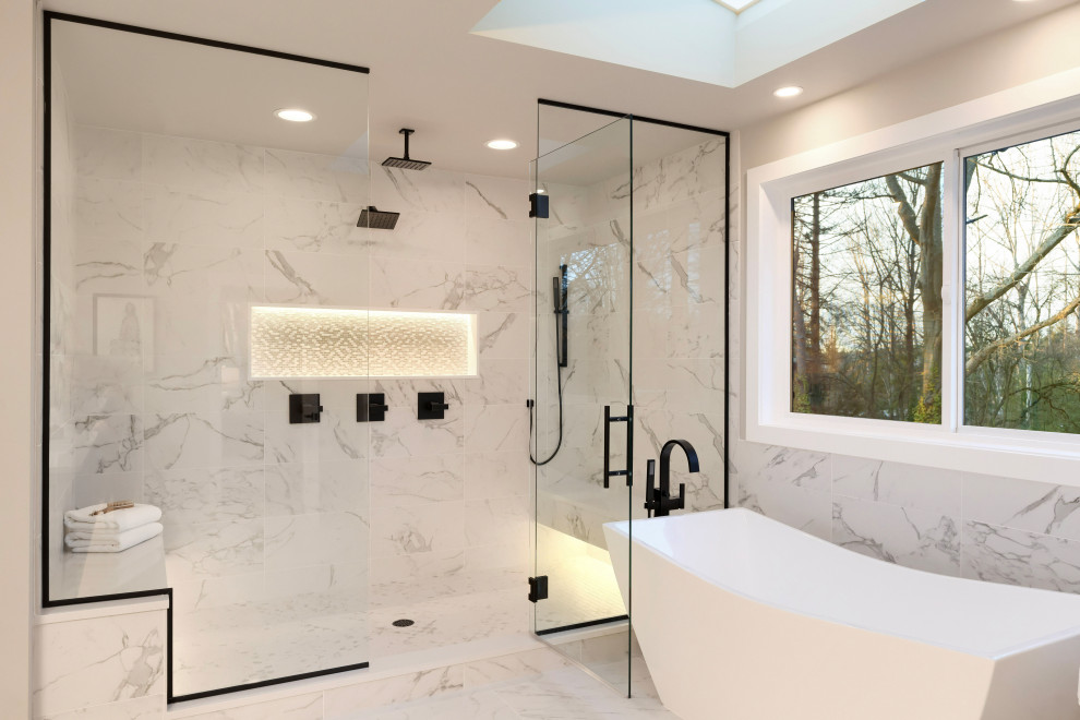 Design ideas for a large modern master bathroom in Orange County with flat-panel cabinets, brown cabinets, a freestanding tub, an alcove shower, white tile, marble, white walls, marble floors, a drop-in sink, solid surface benchtops, white floor, a hinged shower door, white benchtops, a shower seat, a double vanity, a built-in vanity, wallpaper and wallpaper.