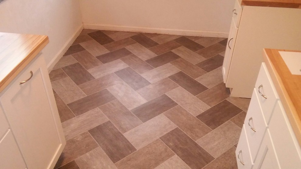 Example of a minimalist vinyl floor kitchen design in Indianapolis