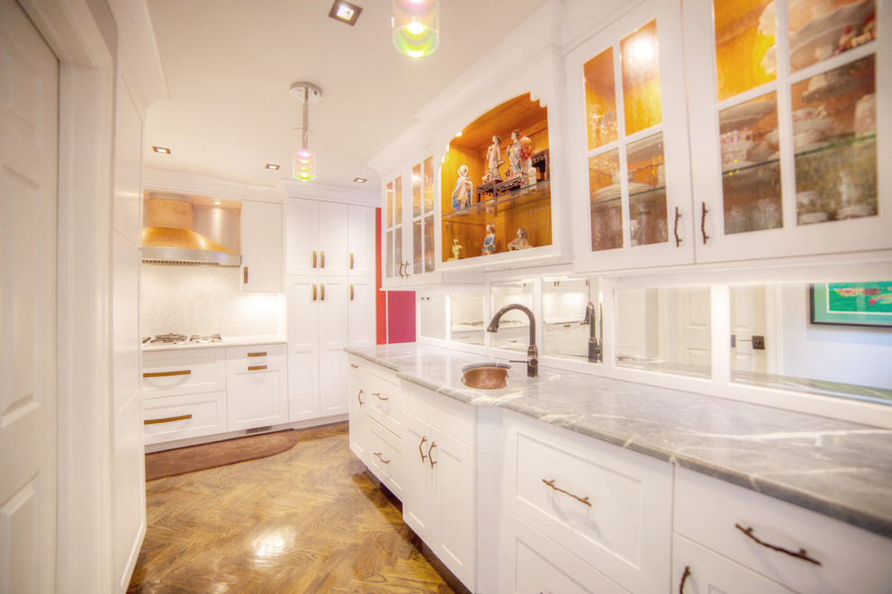 Design ideas for a small asian kitchen in New York with white appliances.